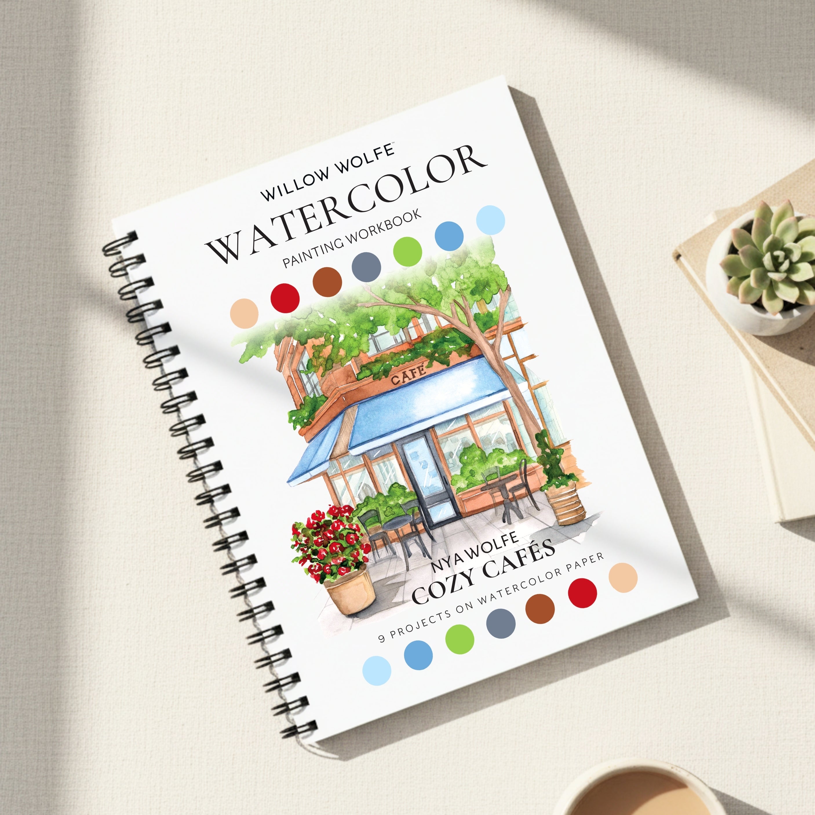 Cozy Cafés Watercolor Workbook by Nya Wolfe