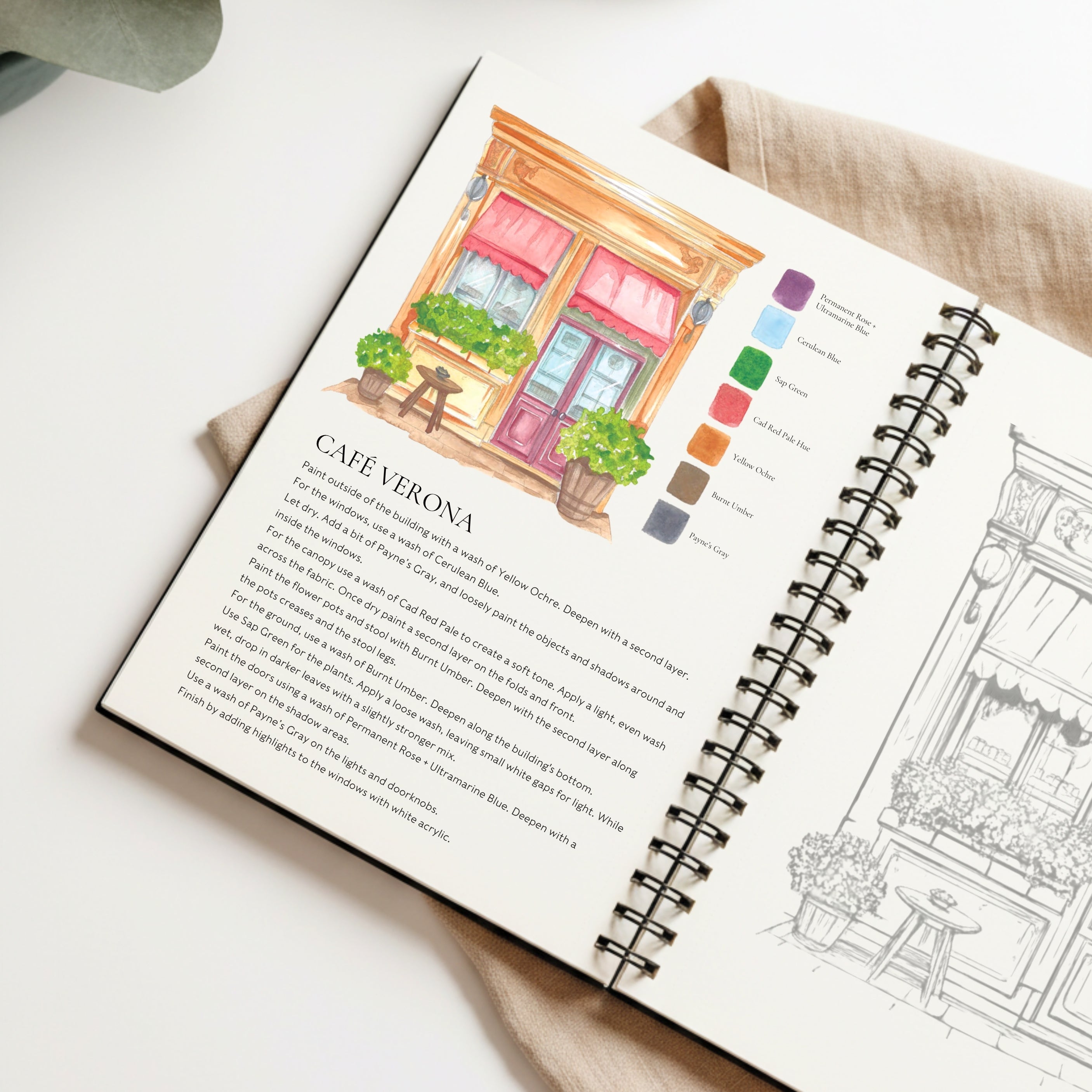 Cozy Cafés Watercolor Workbook by Nya Wolfe