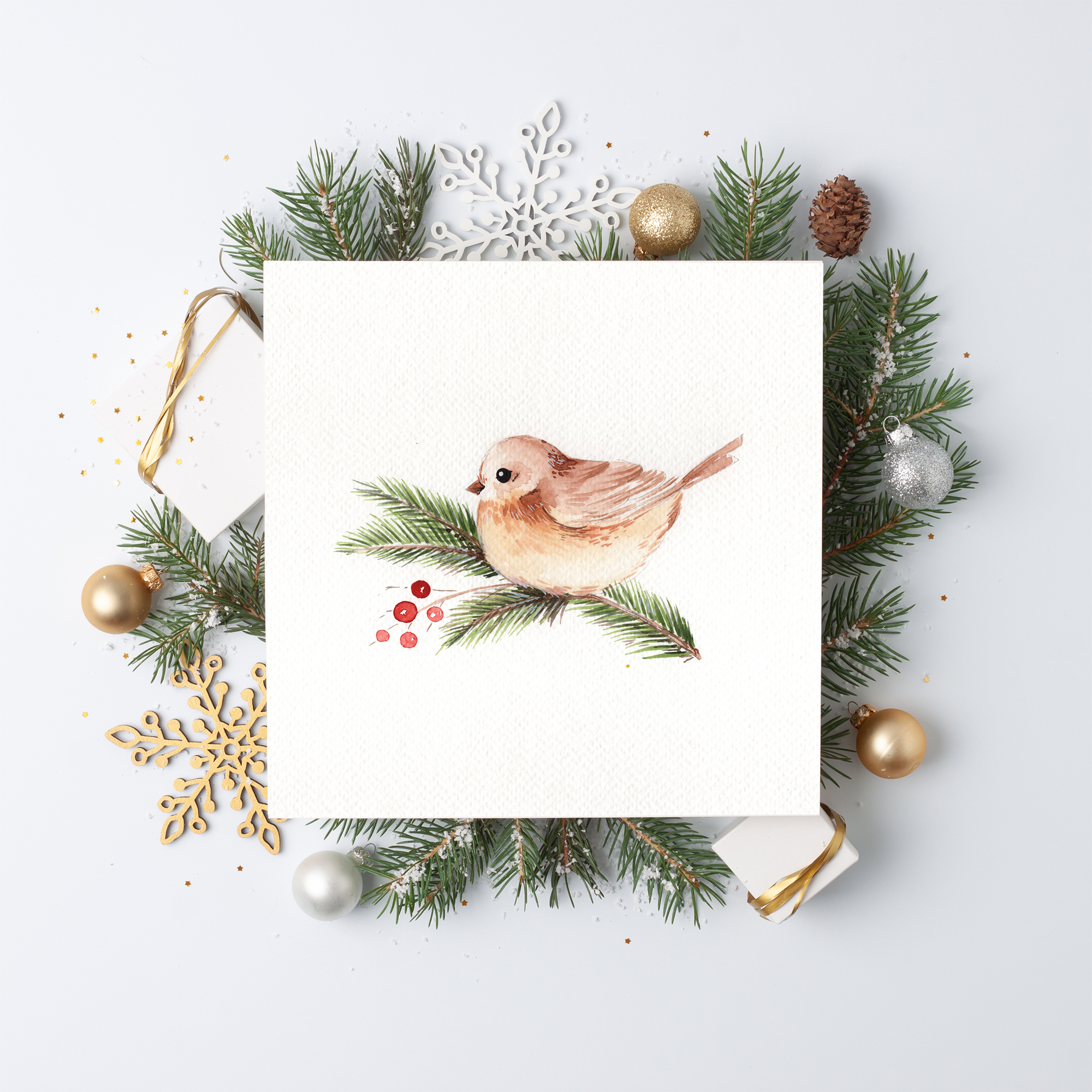 Christmas decorations with mock up greetings card and gifts on white background. Flat lay, copy space